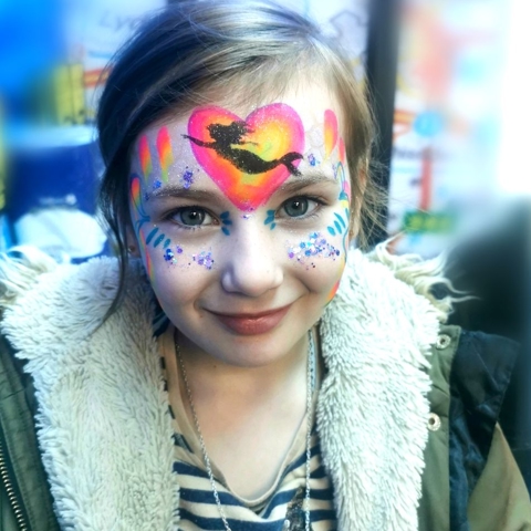 Bright colour Mermaid Face paint with glitter